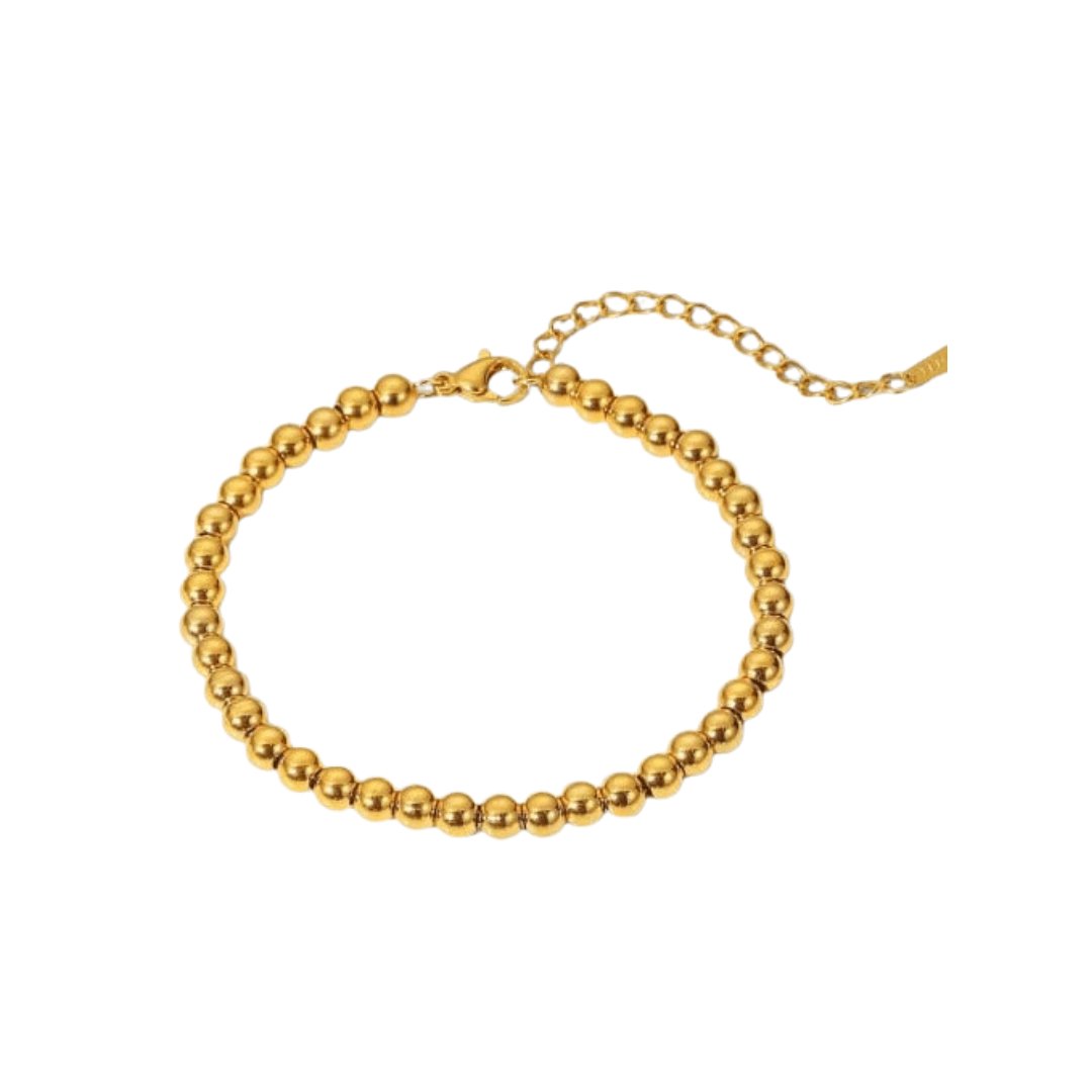 Add some sparkle to your bracelet stack with the Katie Bracelet! ✨ Featuring gold bead details, it’s perfect for mixing and matching with Ash and Ash. Crafted from 18K gold plated stainless steel, it’s water-resistant, tarnish-free, and nickel-free. P.S.