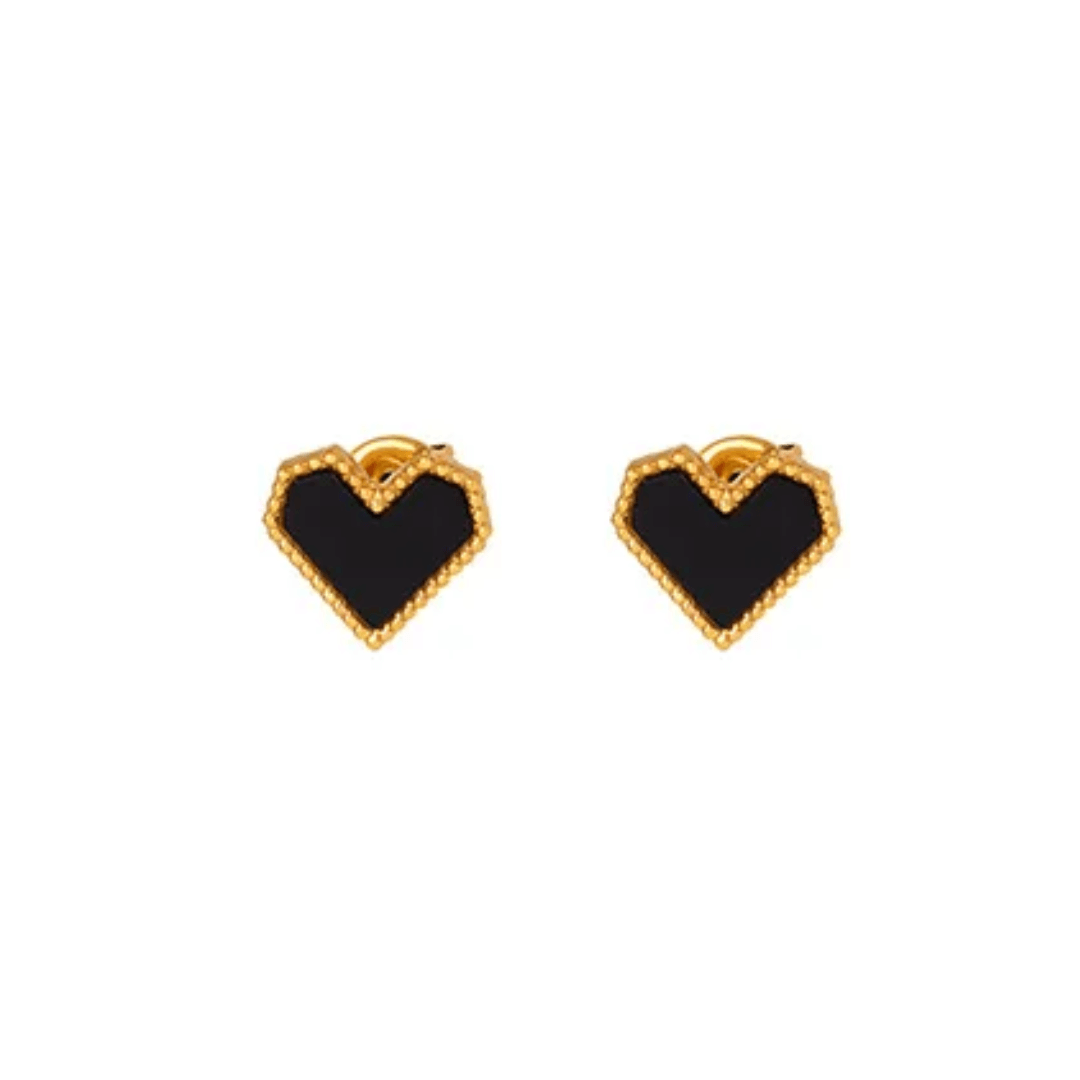 Sold as a pair, these Black Heart Stud Earrings feature bold black hearts that add a touch of edgy elegance to any outfit. Crafted from high-quality materials for durability and comfort, they’re perfect for making a statement. Inspired by that effortlessl