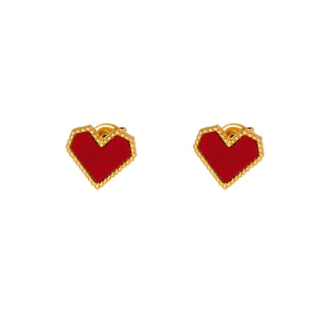 Make a statement with our Red Heart Stud Earrings! ❤️ The vibrant red hue adds a fiery pop of passion to any outfit. Lightweight and comfortable, these earrings are perfect for both daily wear and special occasions. Show off your love and confidence with